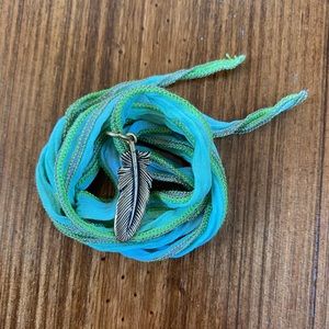 Turquoise Silk Cord with Feather Pendant